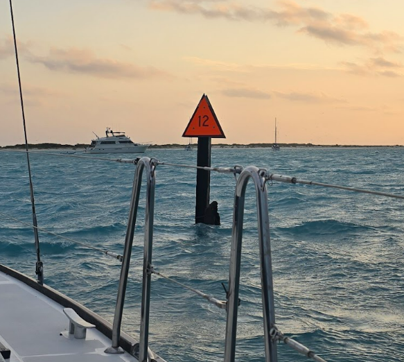 Marker 12 next to the boat at Dry Tortugas
